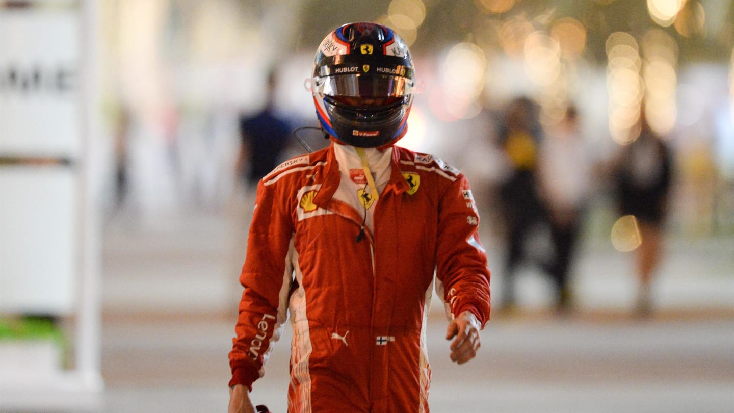 Kimi Raikkonen (FIN) Ferrari walks in after stopping on track in FP2 at Formula One World Championship, Rd2, Bahrain Grand Prix, Practice, Bahrain International Circuit, Sakhir, Bahrain, Friday 6 April 2018. © Simon Galloway/Sutton Images
