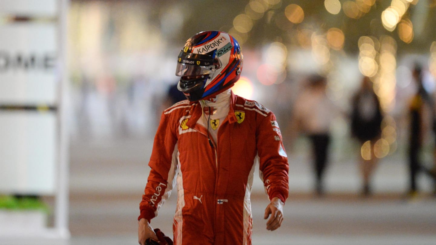 Kimi Raikkonen (FIN) Ferrari walks in after stopping on track in FP2 at Formula One World Championship, Rd2, Bahrain Grand Prix, Practice, Bahrain International Circuit, Sakhir, Bahrain, Friday 6 April 2018. © Simon Galloway/Sutton Images
