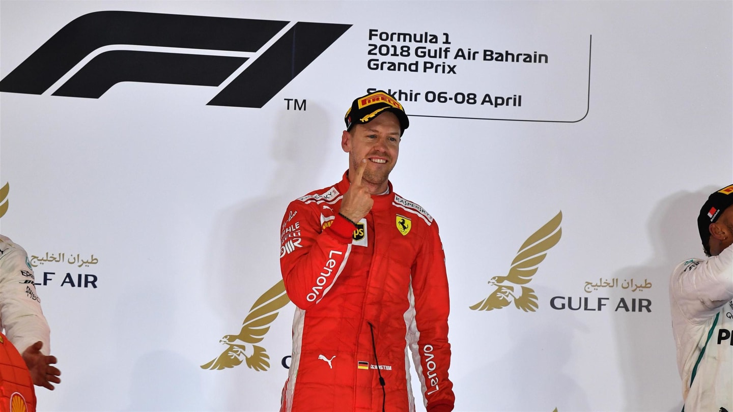 Race winner Sebastian Vettel (GER) Ferrari celebrates on the podium at Formula One World Championship, Rd2, Bahrain Grand Prix, Race, Bahrain International Circuit, Sakhir, Bahrain, Sunday 8 April 2018. © Mark Sutton/Sutton Images