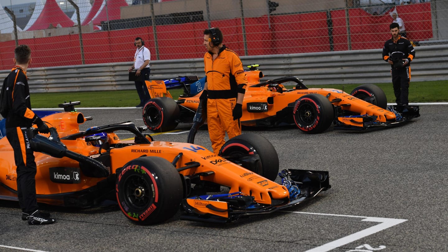 Fernando Alonso (ESP) McLaren and Stoffel Vandoorne (BEL) McLaren on the grid at Formula One World Championship, Rd2, Bahrain Grand Prix, Race, Bahrain International Circuit, Sakhir, Bahrain, Sunday 8 April 2018. © Jerry Andre/Sutton Images