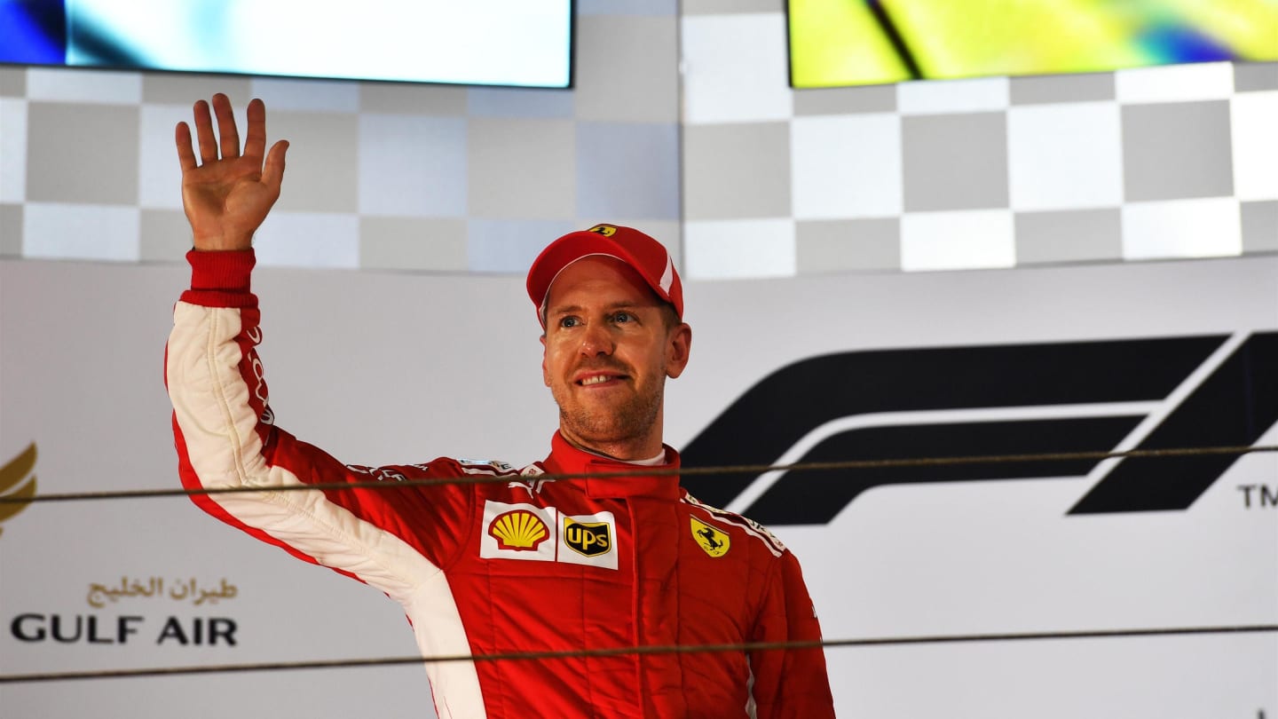 Race winner Sebastian Vettel (GER) Ferrari celebrates on the podium at Formula One World Championship, Rd2, Bahrain Grand Prix, Race, Bahrain International Circuit, Sakhir, Bahrain, Sunday 8 April 2018. © Jerry Andre/Sutton Images