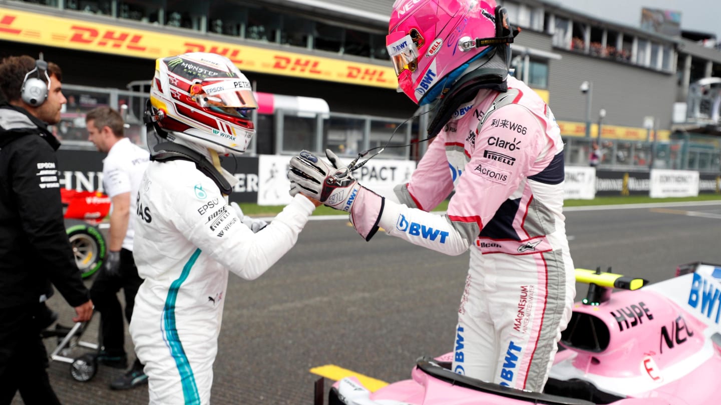 Lewis Hamilton, Mercedes AMG F1 and Esteban Ocon, Racing Point Force India VJM11 celebrate in parc