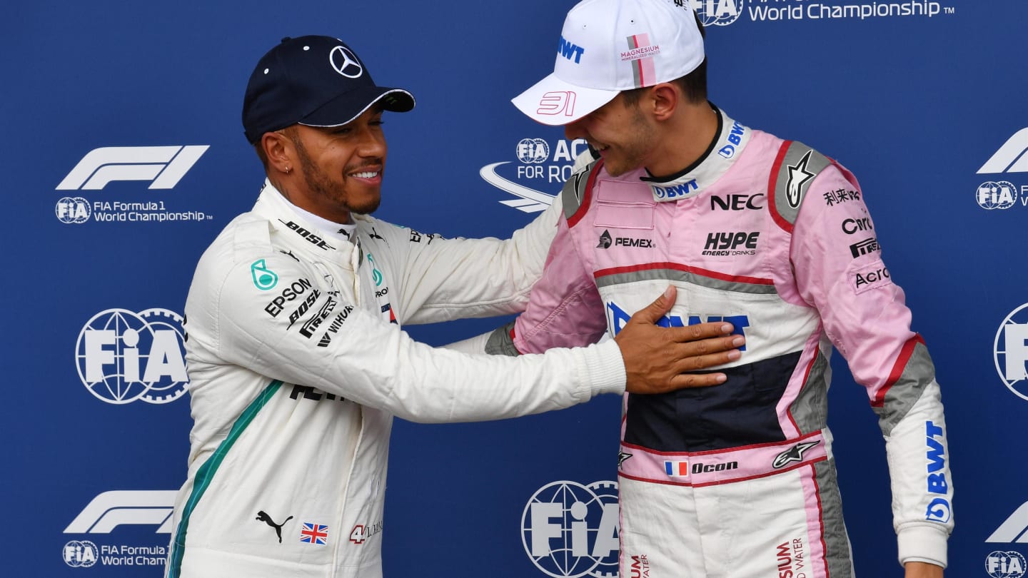 Lewis Hamilton, Mercedes AMG F1 and Esteban Ocon, Racing Point Force India F1 Team celebrate in