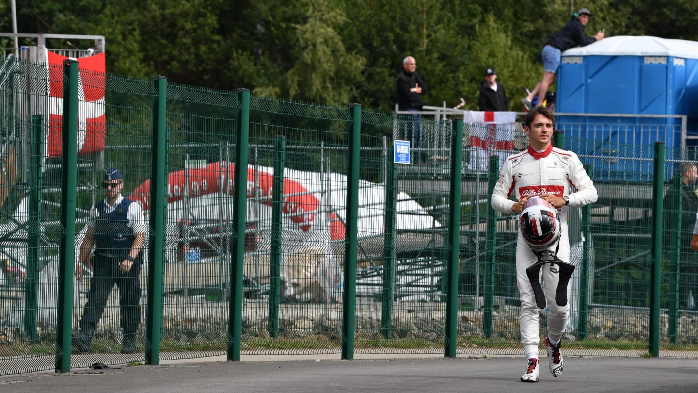 Race retiree Charles Leclerc, Alfa Romeo Sauber F1 Team walks in at Formula One World Championship,