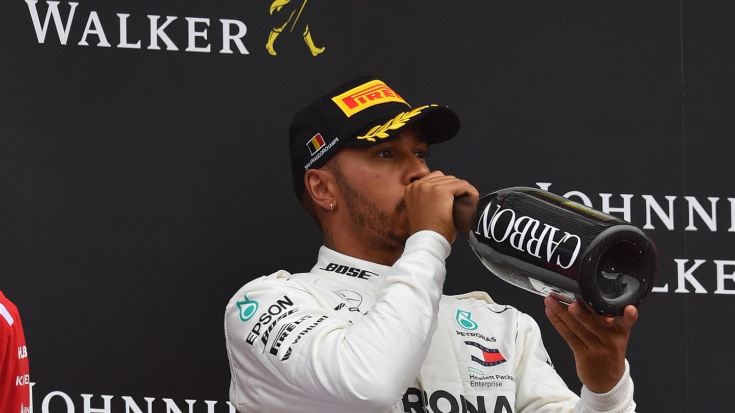 Lewis Hamilton, Mercedes AMG F1 celebrates with the champagne on the podium at Formula One World Championship, Rd13, Belgian Grand Prix, Race, Spa Francorchamps, Belgium, Sunday 26 August 2018. © Jose Rubio/Sutton Images