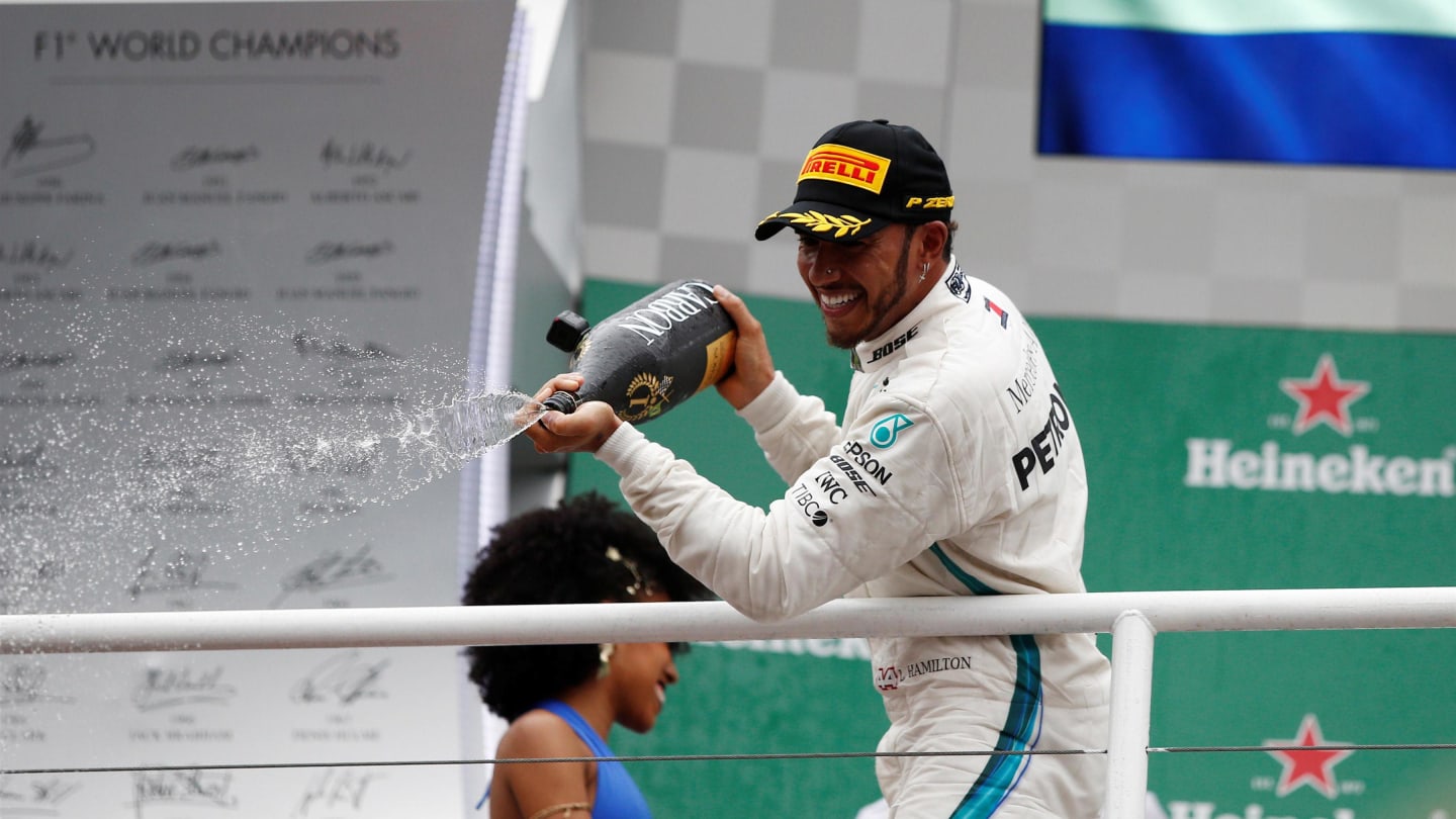 Lewis Hamilton, Mercedes AMG F1 celebrates on the podium with the champagne at Formula One World