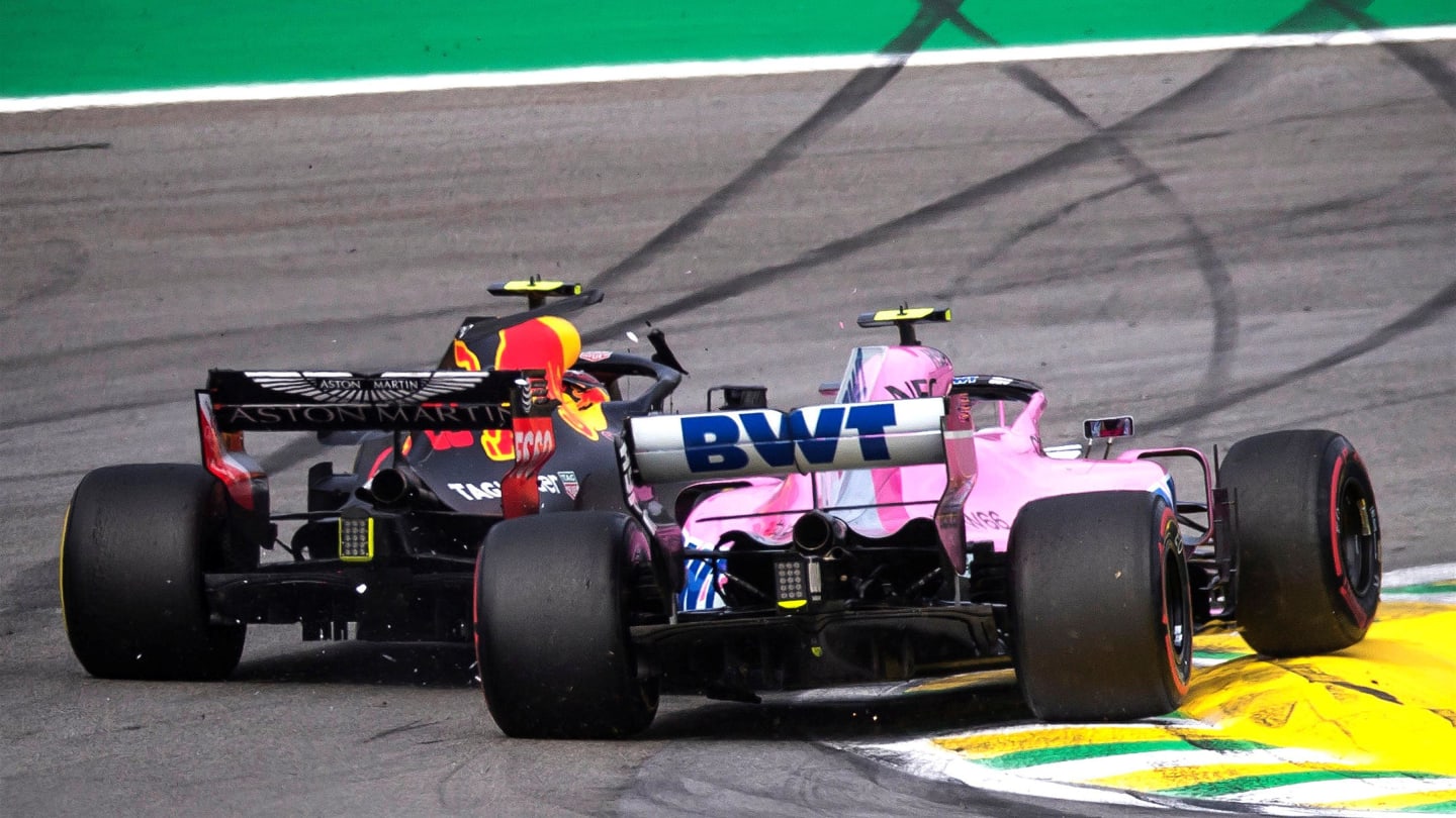 Race leader Max Verstappen, Red Bull Racing RB14 crashes whilst lapping Esteban Ocon, Racing Point Force India VJM11 at Formula One World Championship, Rd20, Brazilian Grand Prix, Race, Interlagos, Sao Paulo, Brazil, Sunday 11 November 2018.
