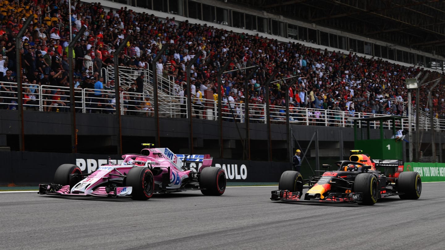 Esteban Ocon, Racing Point Force India VJM11 and Max Verstappen, Red Bull Racing RB14 battle at