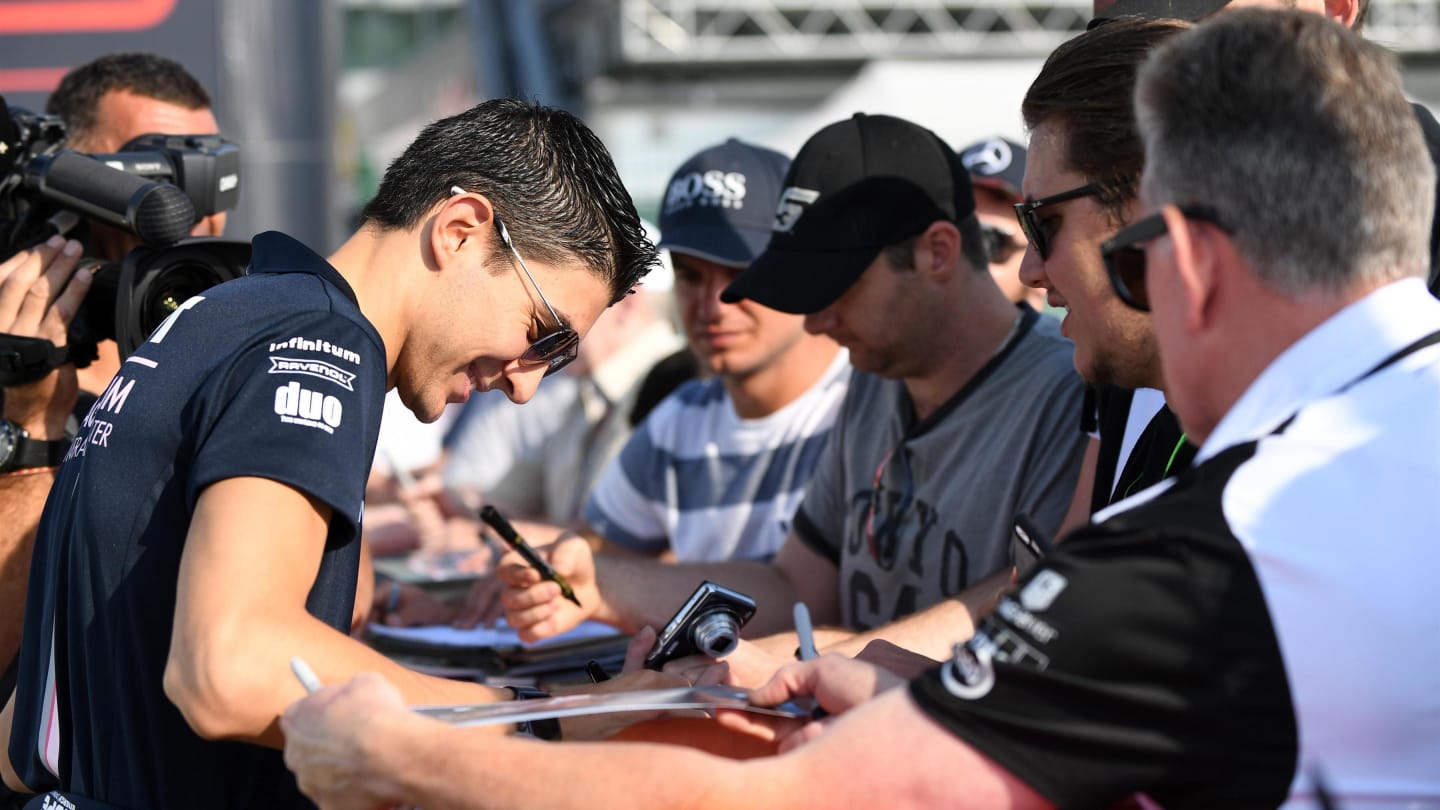 Esteban Ocon (FRA) Force India F1 signs autographs for the fans at Formula One World Championship, Rd10, British Grand Prix, Practice, Silverstone, England, Friday 6 July 2018. © Simon Galloway/Sutton Images