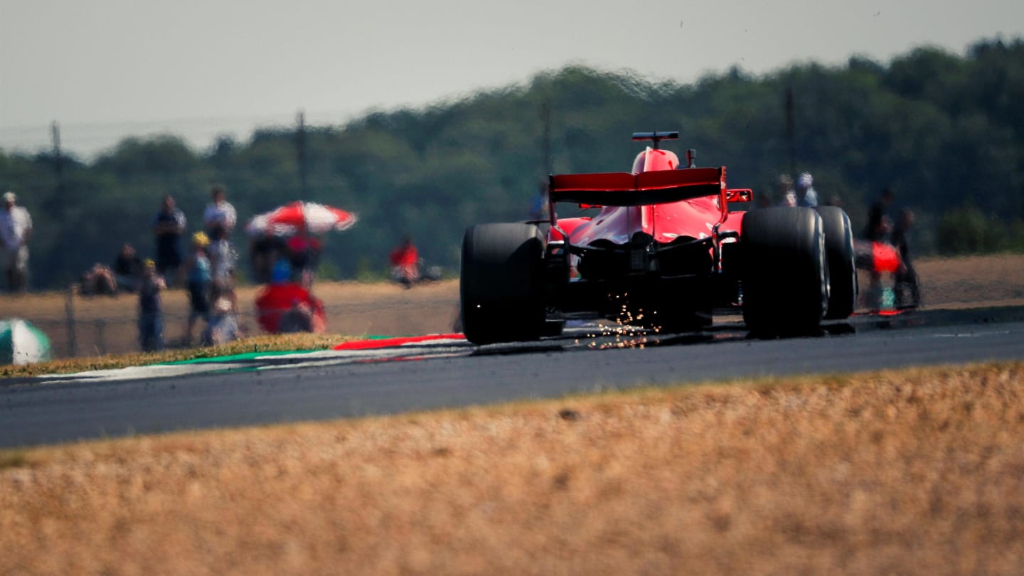 Sebastian Vettel (GER) Ferrari SF-71H sparks at Formula One World Championship, Rd10, British Grand