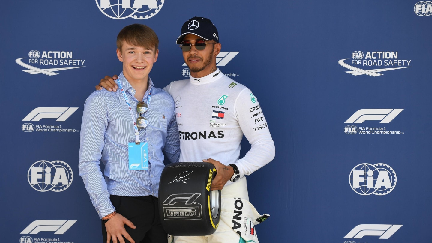 Lewis Hamilton (GBR) Mercedes-AMG F1 receives the Pirelli Pole Position Award from Billy Monger (GBR) at Formula One World Championship, Rd10, British Grand Prix, Qualifying, Silverstone, England, Saturday 7 July 2018. © Manuel Goria/Sutton Images