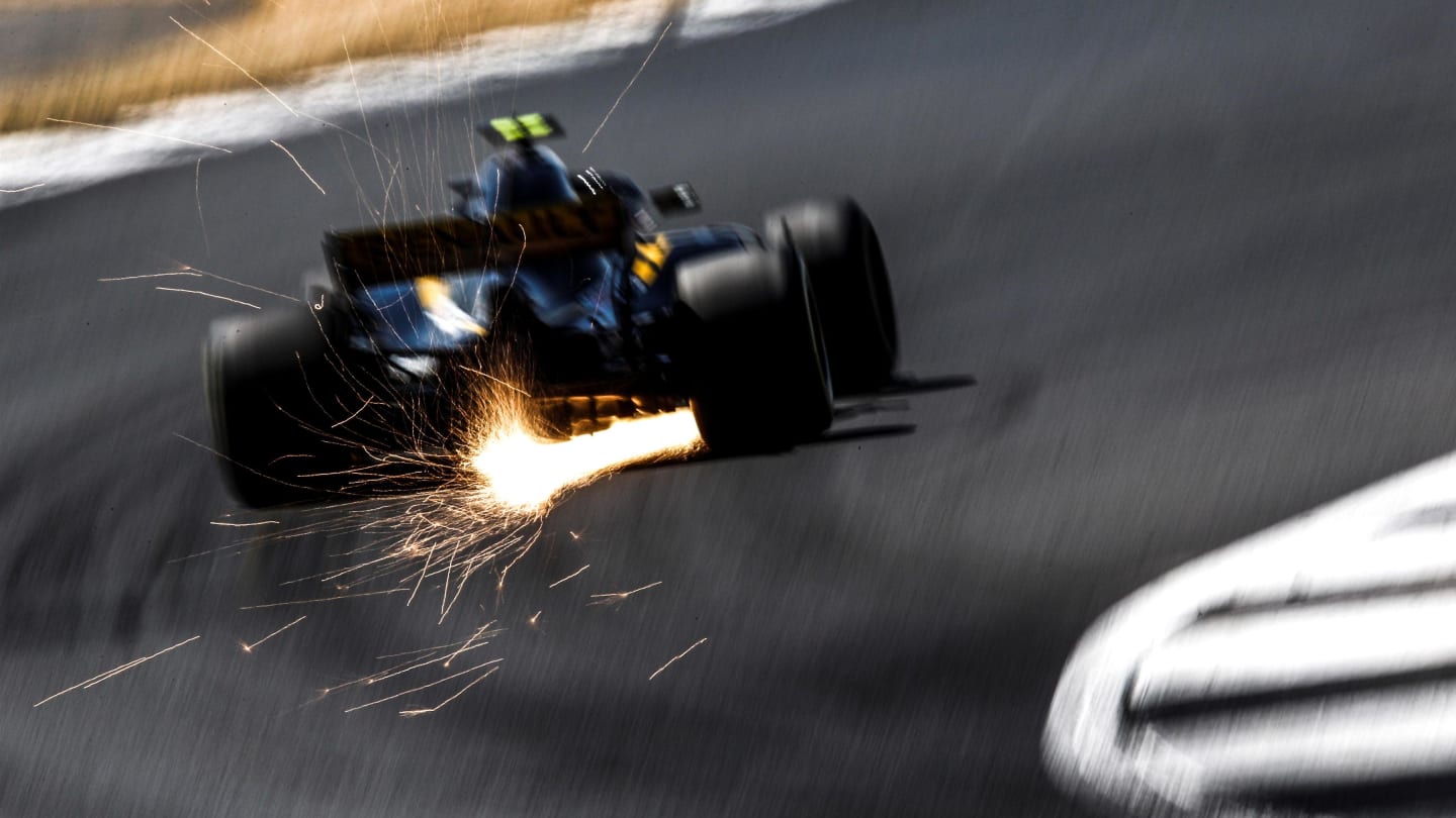 Carlos Sainz jr (ESP) Renault Sport F1 Team RS18 sparks at Formula One World Championship, Rd10,