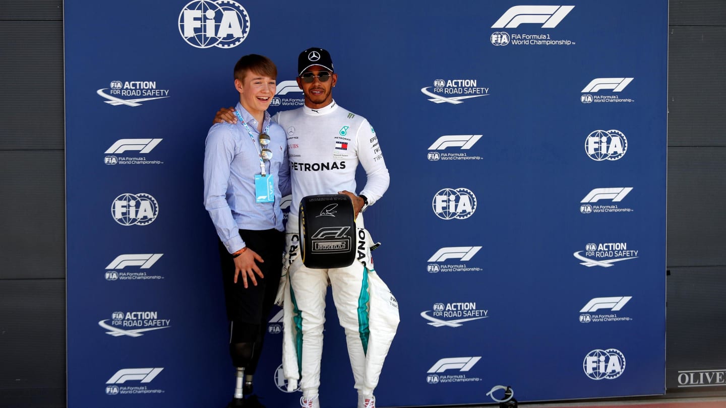 Lewis Hamilton (GBR) Mercedes-AMG F1 receives the Pirelli Pole Position Award from Billy Monger (GBR) at Formula One World Championship, Rd10, British Grand Prix, Qualifying, Silverstone, England, Saturday 7 July 2018. © Manuel Goria/Sutton Images