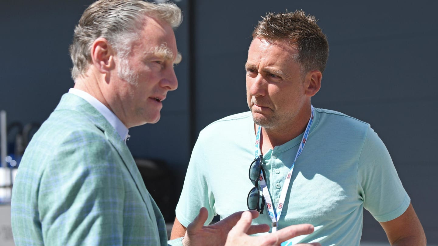 Sean Bratches (USA) Formula One Managing Director, Commercial Operations talking with Ian Poulter