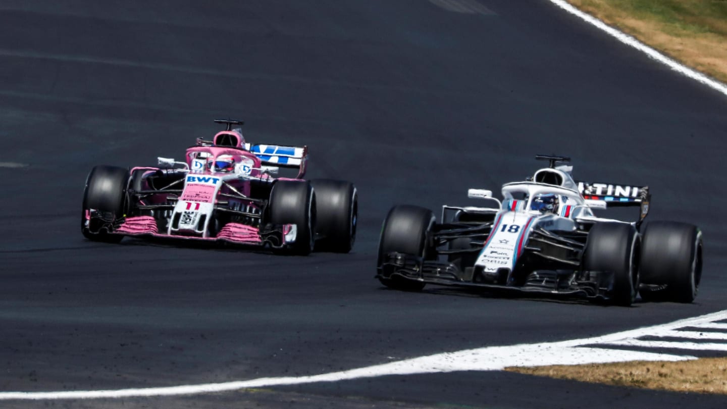 Sergio Perez (MEX) Force India VJM11 and Lance Stroll (CDN) Williams FW41 battle at Formula One