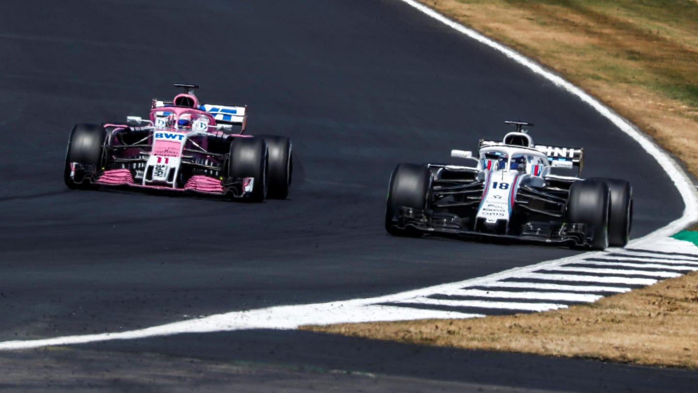 Sergio Perez (MEX) Force India VJM11 and Lance Stroll (CDN) Williams FW41 battle at Formula One
