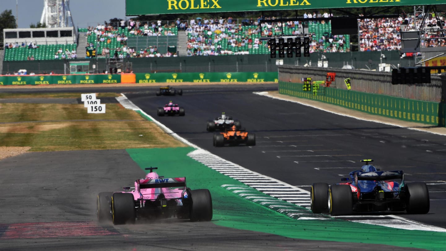 Sergio Perez (MEX) Force India VJM11 and Pierre Gasly (FRA) Scuderia Toro Rosso STR13 battle at Formula One World Championship, Rd10, British Grand Prix, Race, Silverstone, England, Sunday 8 July 2018. © Mark Sutton/Sutton Images
