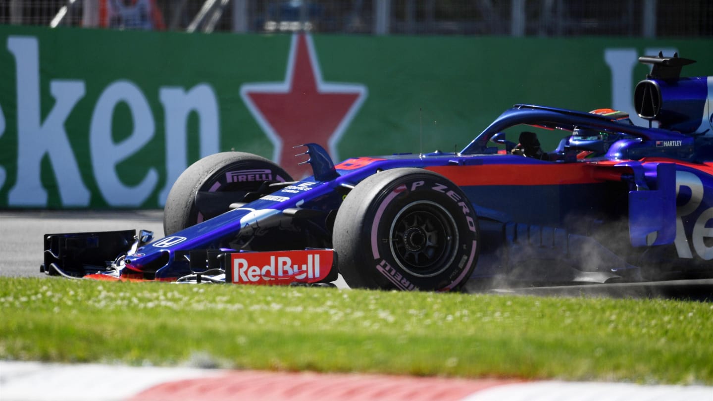 Brendon Hartley (NZL) Scuderia Toro Rosso STR13 runs wide across the grass at Formula One World Championship, Rd7, Canadian Grand Prix, Practice, Montreal, Canada, Friday 8 June 2018. © Simon Galloway/Sutton Images