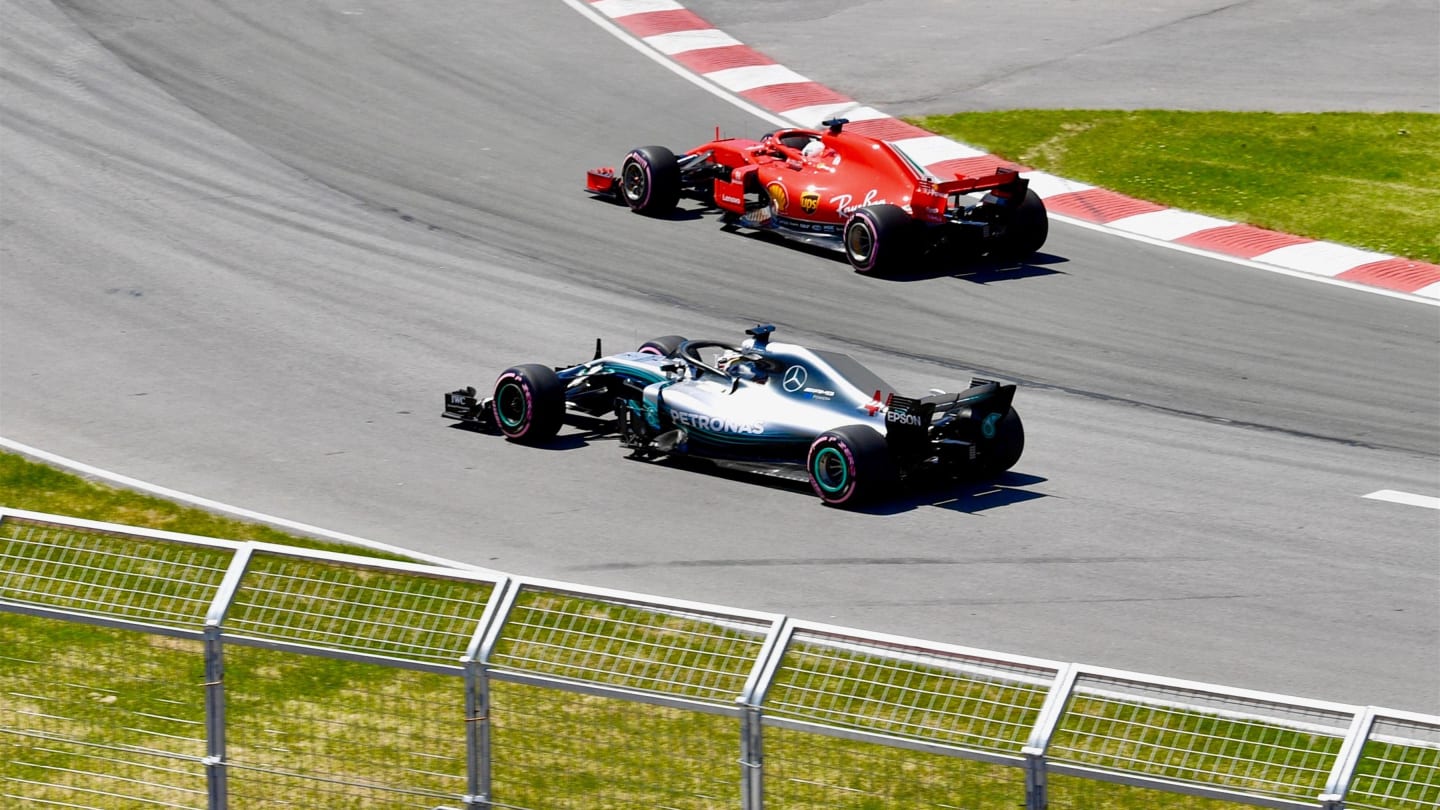Lewis Hamilton (GBR) Mercedes-AMG F1 W09 EQ Power+ and Sebastian Vettel (GER) Ferrari SF-71H at Formula One World Championship, Rd7, Canadian Grand Prix, Qualifying, Montreal, Canada, Saturday 9 June 2018. © Jerry Andre/Sutton Images