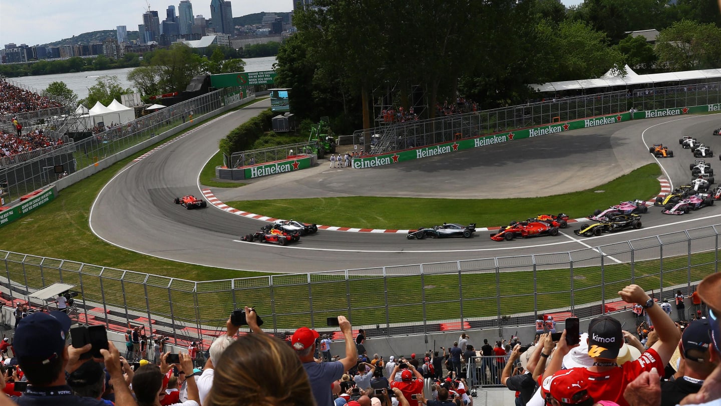 Sebastian Vettel (GER) Ferrari SF-71H leads at the start of the race at Formula One World