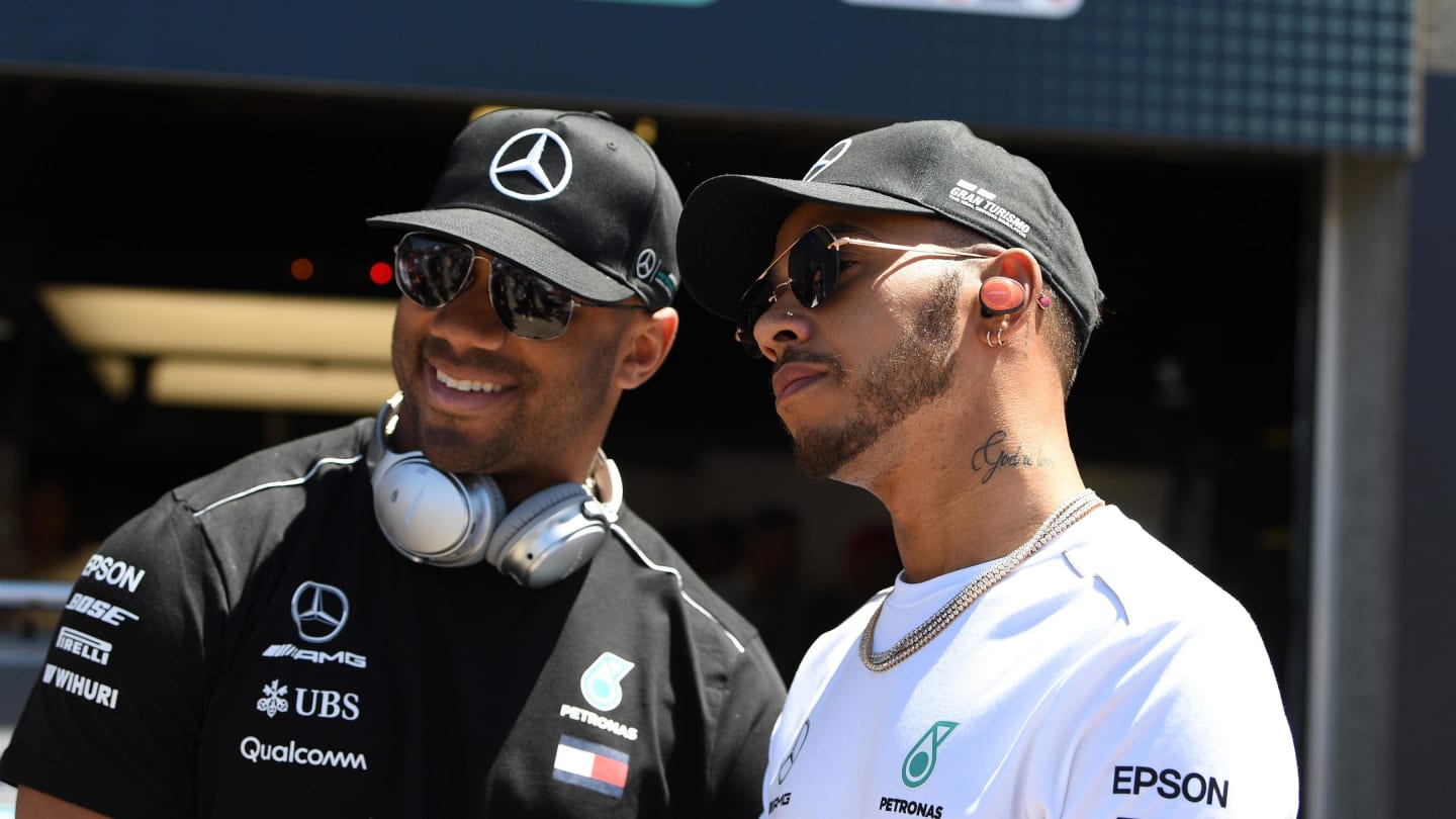 Lewis Hamilton (GBR) Mercedes-AMG F1 and Seattle Seahawks Quarterback Russell Wilson (USA) at Formula One World Championship, Rd7, Canadian Grand Prix, Race, Montreal, Canada, Sunday10 June 2018. © Simon Galloway/Sutton Images