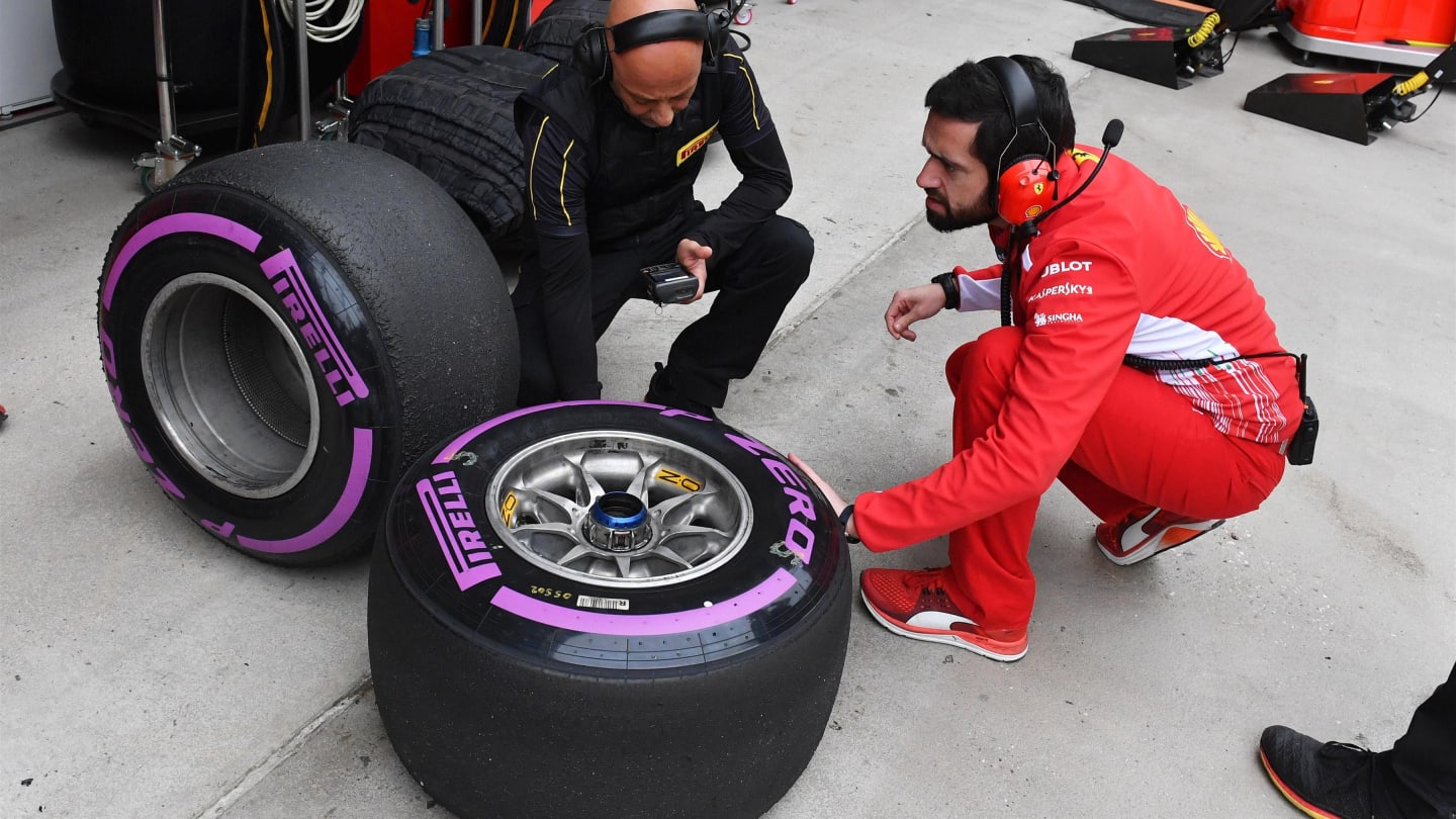 Ferrari and Pirelli engineers with Pirelli tyres at Formula One World Championship, Rd3, Chinese Grand Prix, Practice, Shanghai, China, Friday 13 April 2018. © Mark Sutton/Sutton Images