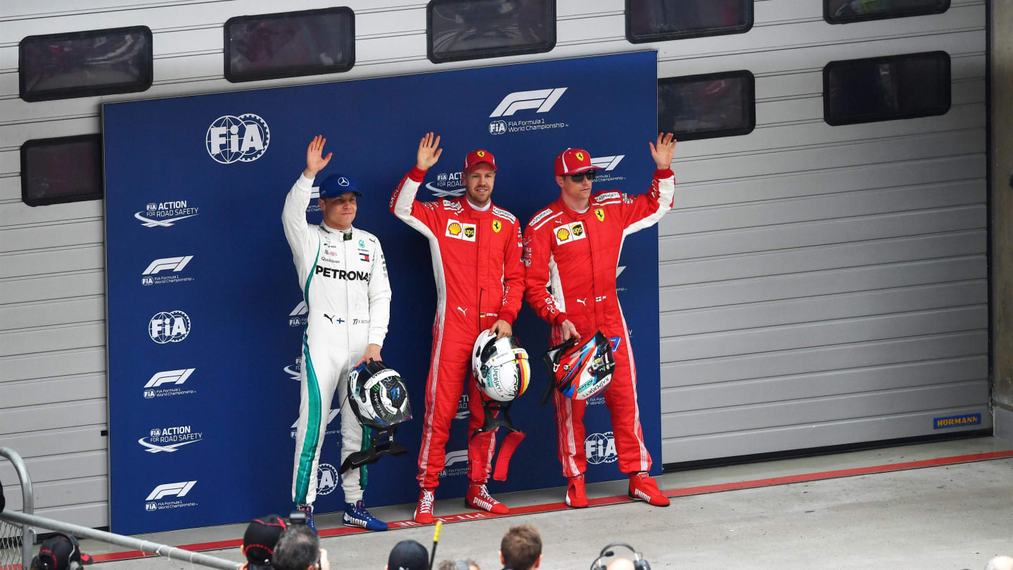 (L to R): Valtteri Bottas (FIN), pole sitter Sebastian Vettel (GER) and Valtteri Bottas (FIN) celebrate in parc ferme at F1 World Championship, Rd3, Chinese Grand Prix, Qualifying, Shanghai, China, Saturday 14 April 2018. © Jerry Andre/Sutton Images