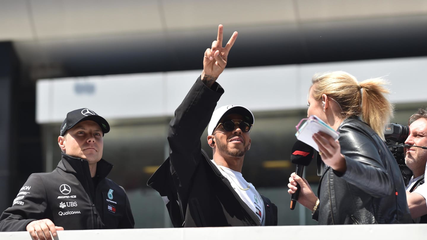 Valtteri Bottas (FIN) Mercedes-AMG F1 and Lewis Hamilton (GBR) Mercedes-AMG F1 on the drivers parade at Formula One World Championship, Rd3, Chinese Grand Prix, Race, Shanghai, China, Sunday 15 April 2018. © Simon Galloway/Sutton Images