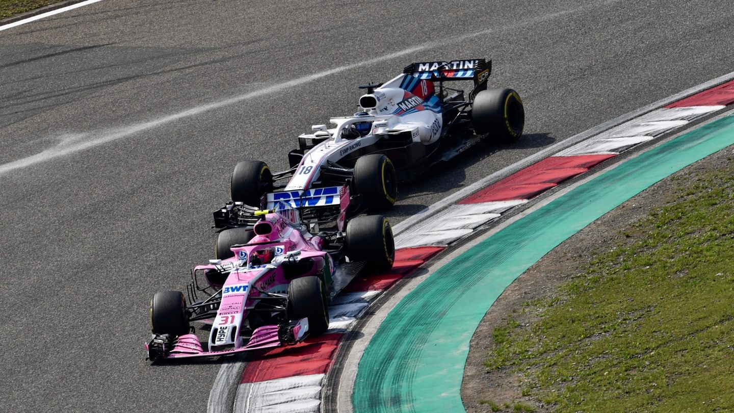 Esteban Ocon (FRA) Force India VJM11 and Lance Stroll (CDN) Williams FW41 at Formula One World