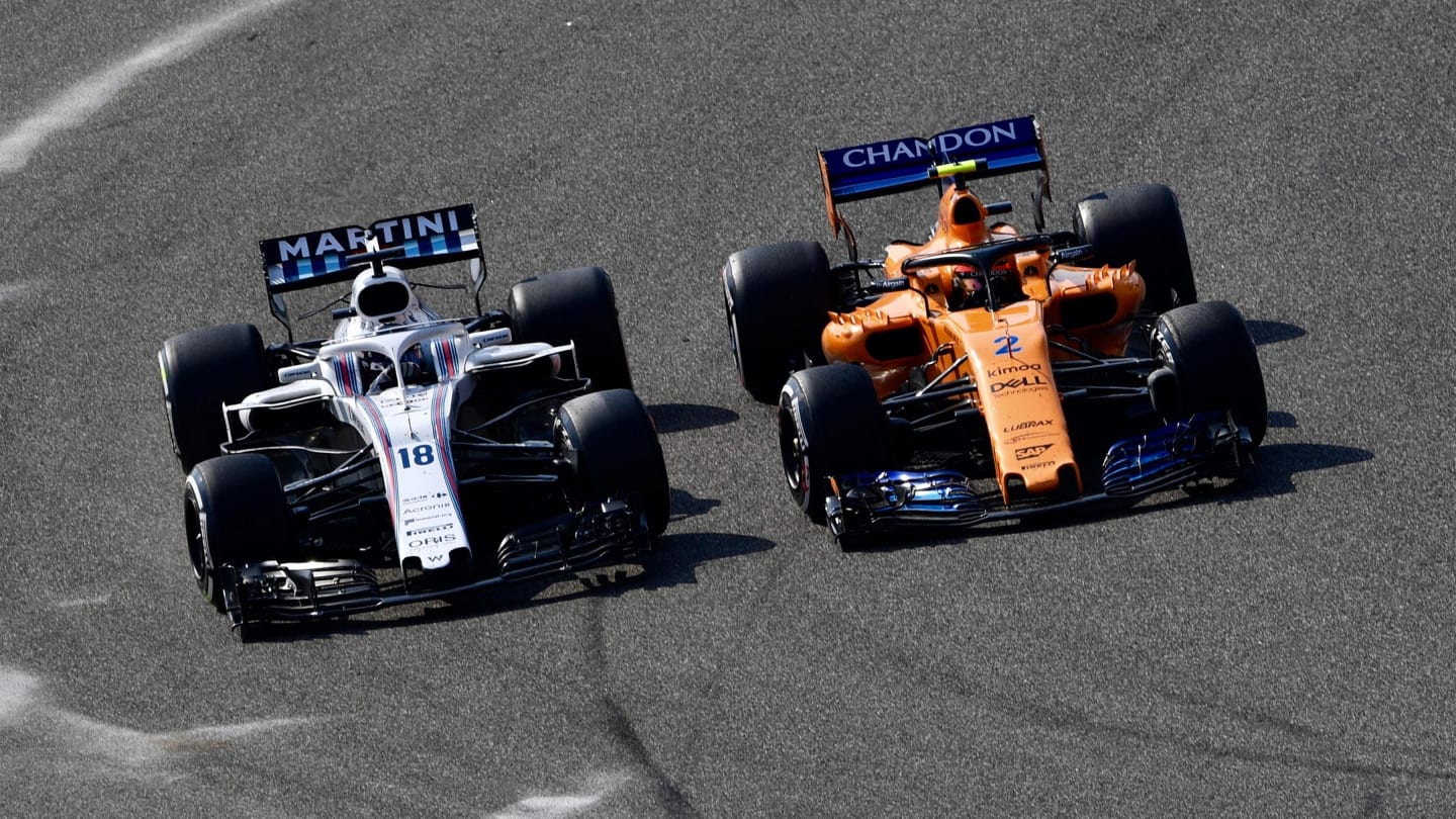 Lance Stroll (CDN) Williams FW41 and Stoffel Vandoorne (BEL) McLaren MCL33 battle at Formula One World Championship, Rd3, Chinese Grand Prix, Race, Shanghai, China, Sunday 15 April 2018. © Jerry Andre/Sutton Images