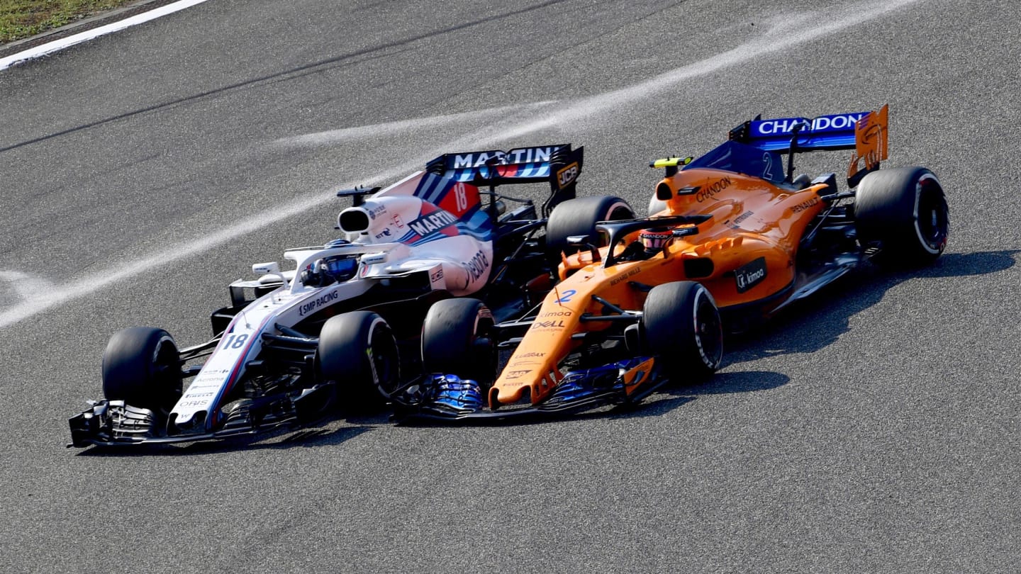 Lance Stroll (CDN) Williams FW41 and Stoffel Vandoorne (BEL) McLaren MCL33 battle at Formula One World Championship, Rd3, Chinese Grand Prix, Race, Shanghai, China, Sunday 15 April 2018. © Jerry Andre/Sutton Images