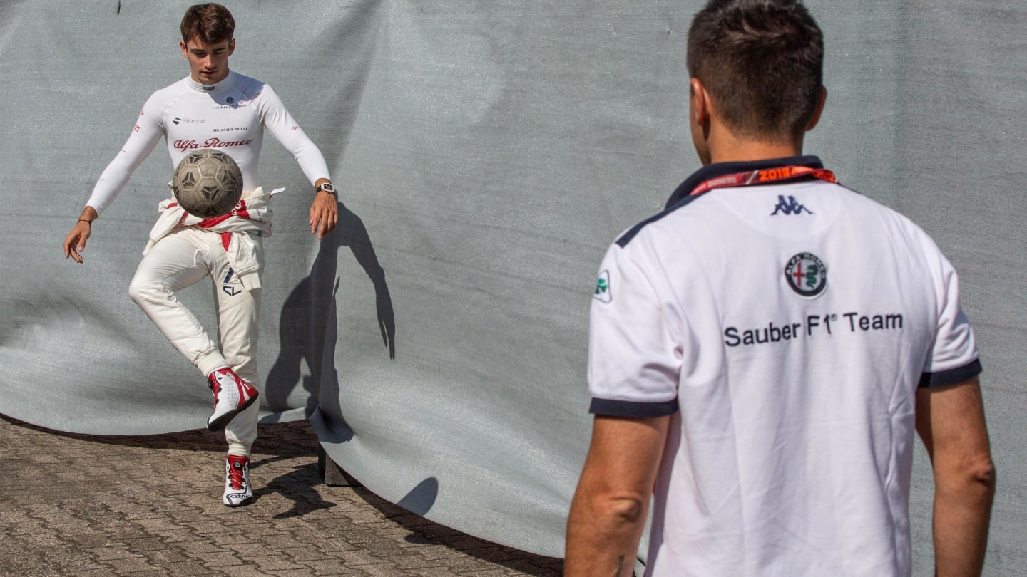 Charles Leclerc (MON) Alfa Romeo Sauber F1 Team warms up playing football with his trainer at Formula One World Championship, Rd11, German Grand Prix, Practice, Hockenheim, Germany, Friday 20 July 2018. © Manuel Goria/Sutton Images