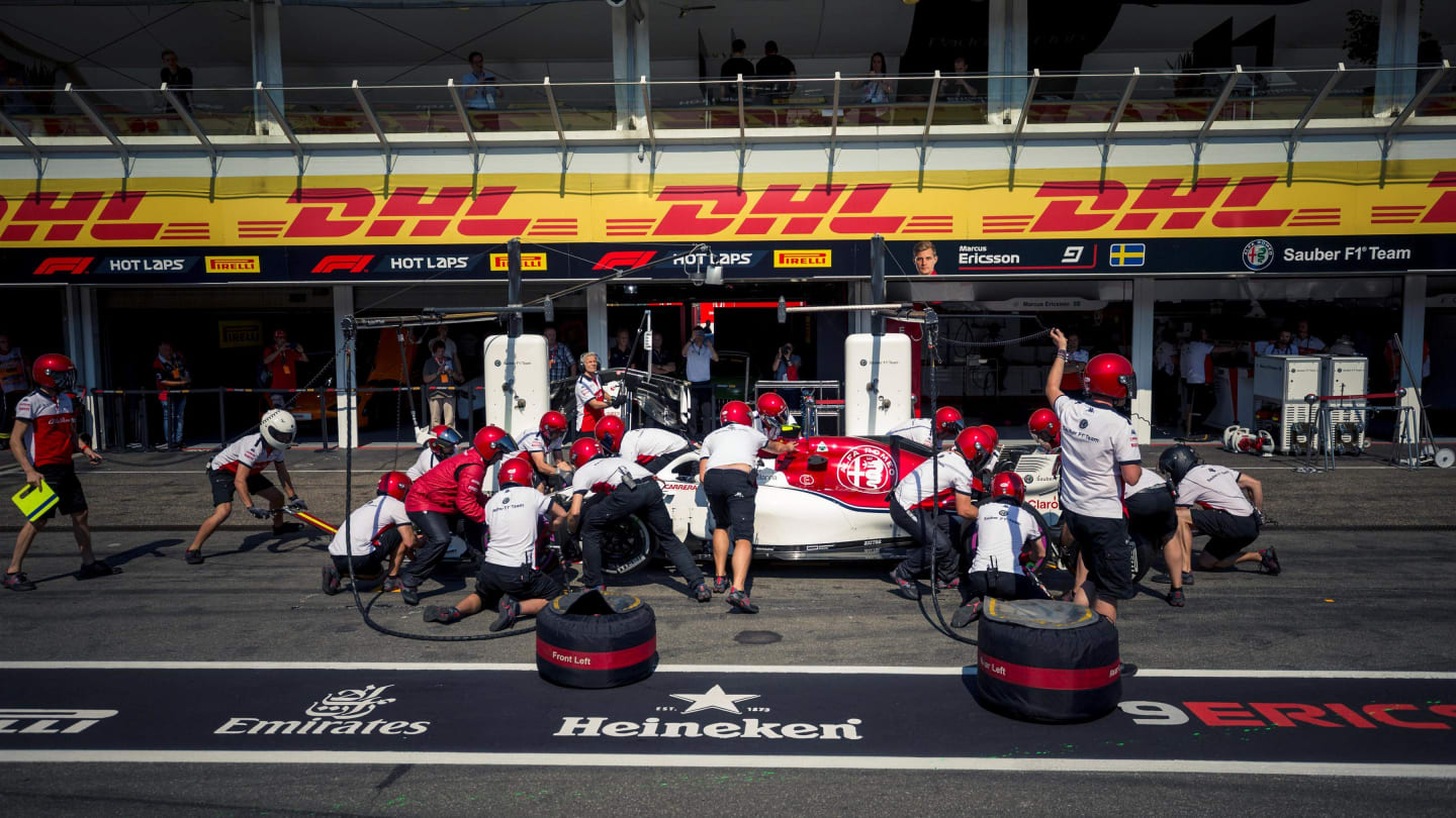 Charles Leclerc (MON) Alfa Romeo Sauber C37 pit stop at Formula One World Championship, Rd11,