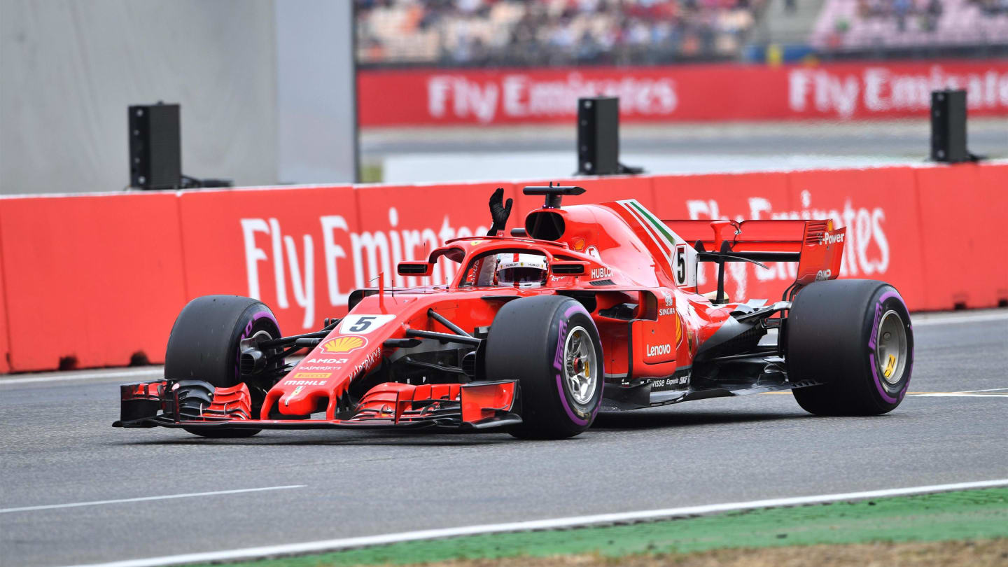 Pole sitter Sebastian Vettel (GER) Ferrari SF-71H celebrates at Formula One World Championship,