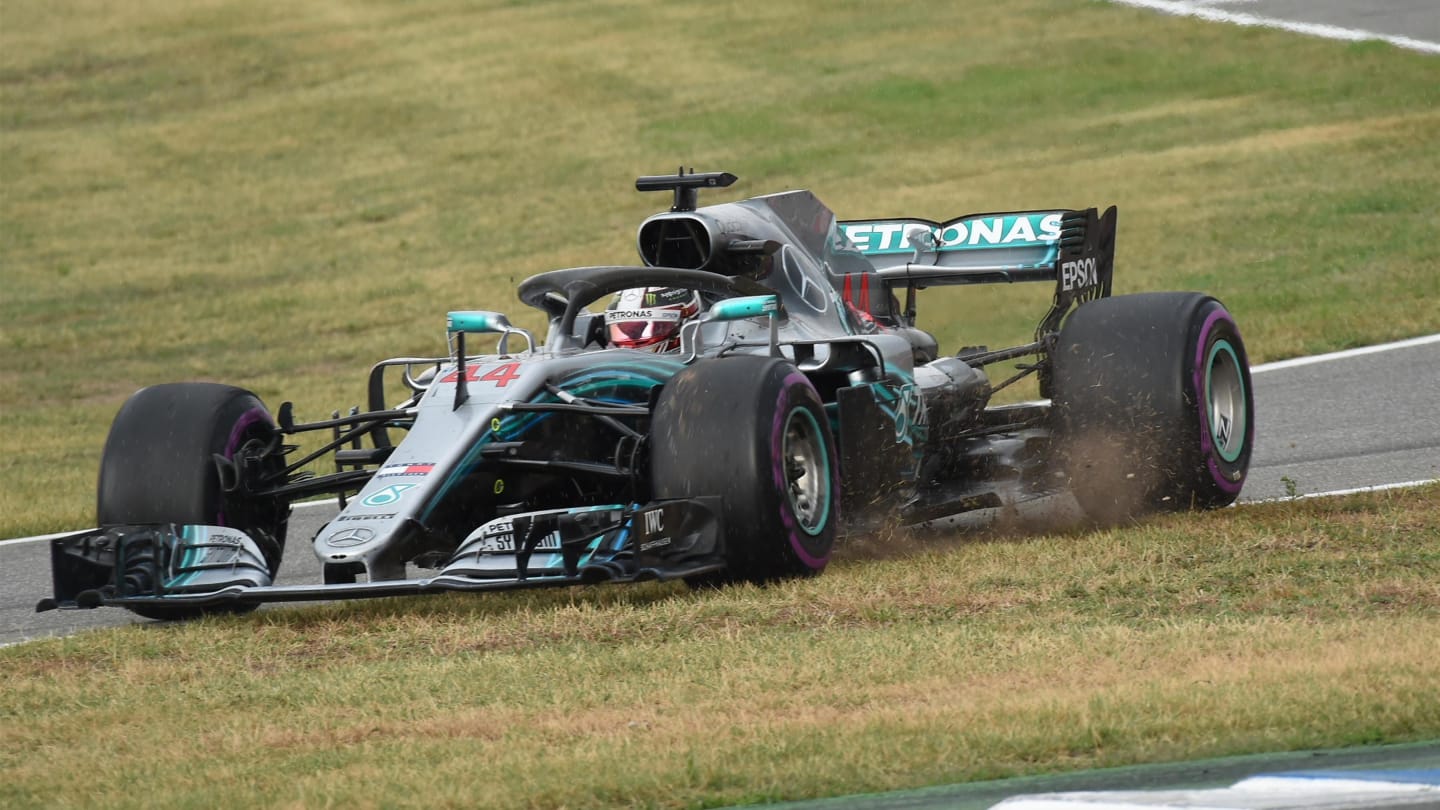 Lewis Hamilton (GBR) Mercedes-AMG F1 W09 EQ Power+ goes across the grass at pit lane entry at Formula One World Championship, Rd11, German Grand Prix, Race, Hockenheim, Germany, Sunday 22 July 2018. © Jose Rubio/Sutton Images