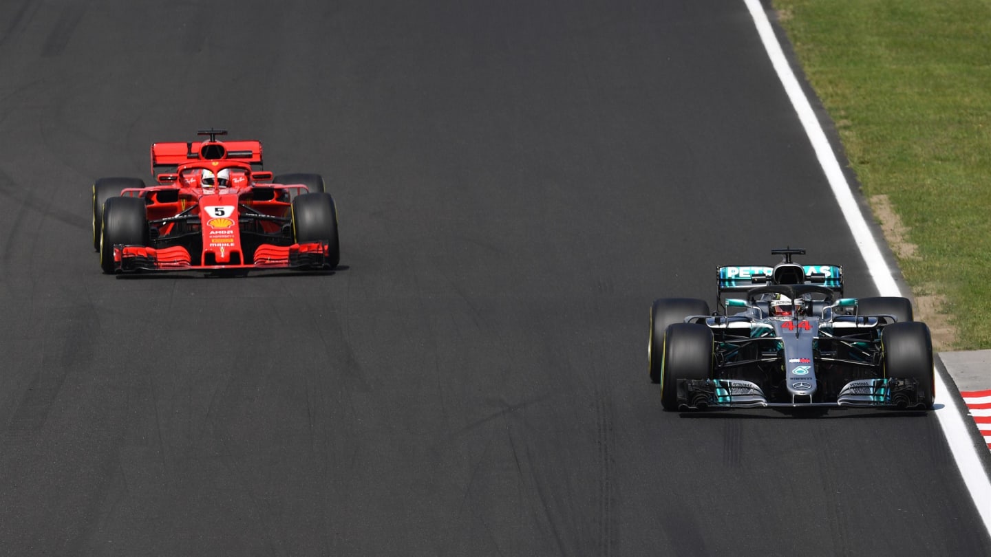 Lewis Hamilton (GBR) Mercedes-AMG F1 W09 EQ Power+ and Sebastian Vettel (GER) Ferrari SF-71H at Formula One World Championship, Rd12, Hungarian Grand Prix, Practice, Hungaroring, Hungary, Friday 27 July 2018. © Jerry Andre/Sutton Images