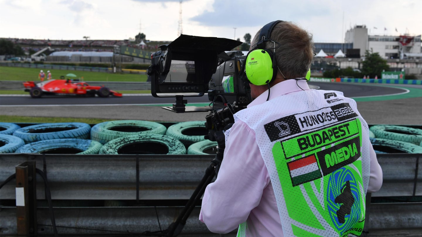 Martin Brundle (GBR) Sky TV operates a TV camera at Formula One World Championship, Rd12, Hungarian