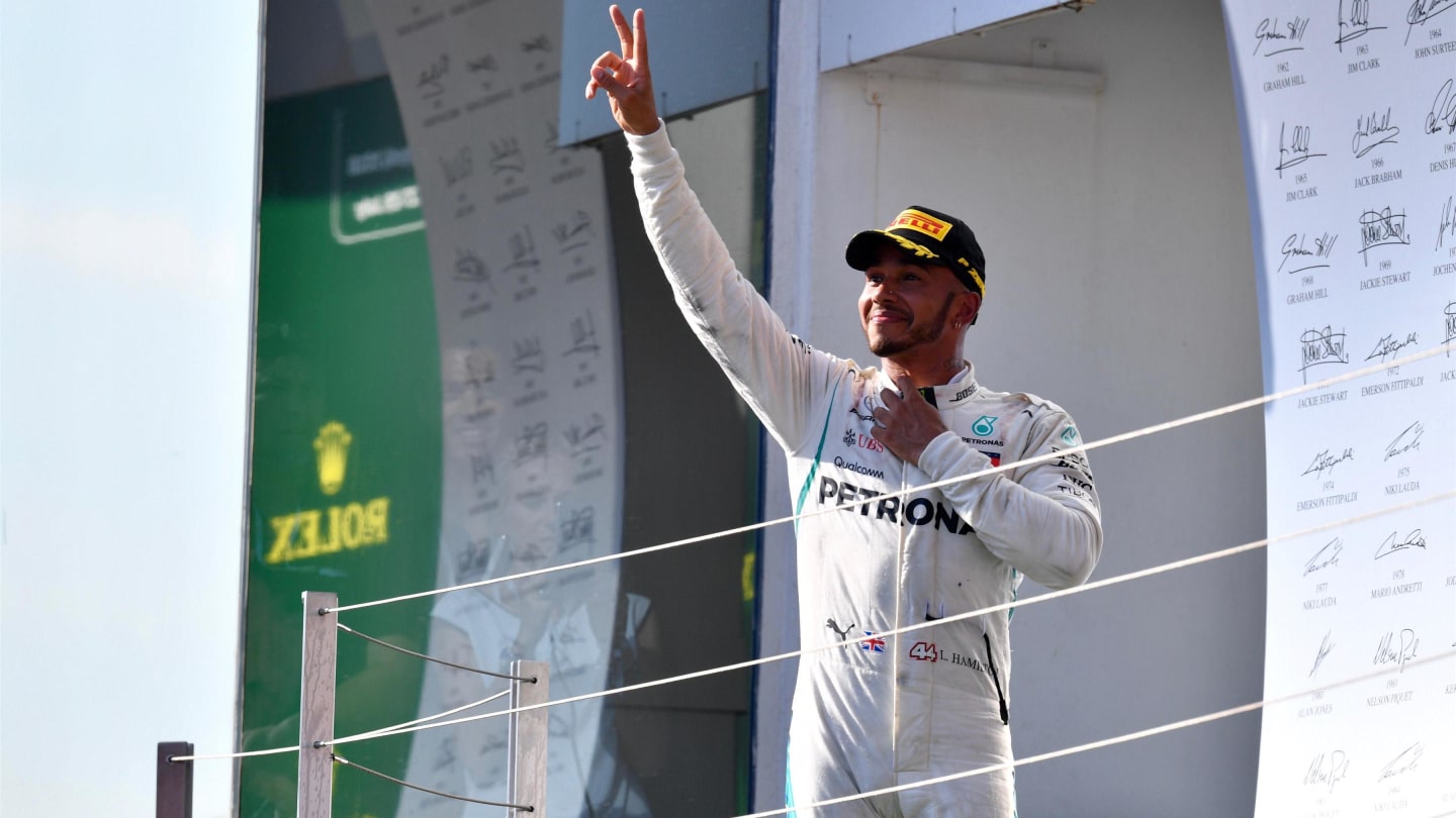 Lewis Hamilton (GBR) Mercedes-AMG F1 celebrates on the podium at Formula One World Championship,