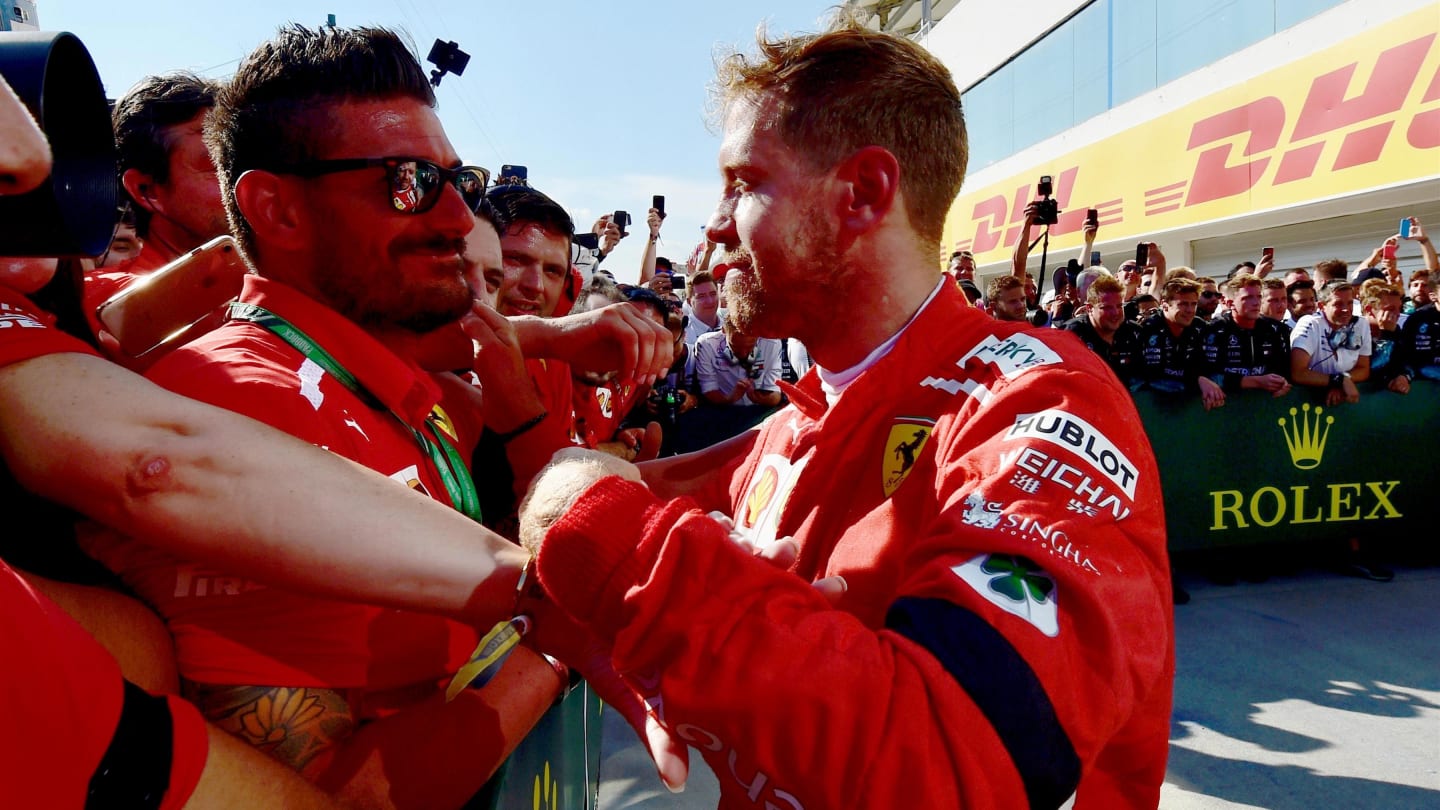 Sebastian Vettel (GER) Ferrari celebrates in parc ferme at Formula One World Championship, Rd12,