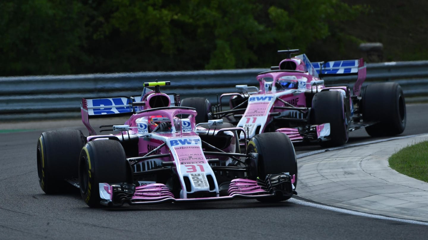 Esteban Ocon (FRA) Force India VJM11 leads Sergio Perez (MEX) Force India VJM11 at Formula One