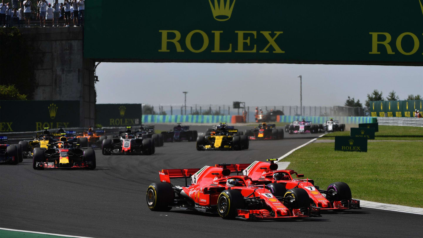 Sebastian Vettel (GER) Ferrari SF-71H and Kimi Raikkonen (FIN) Ferrari SF-71H battle at the start