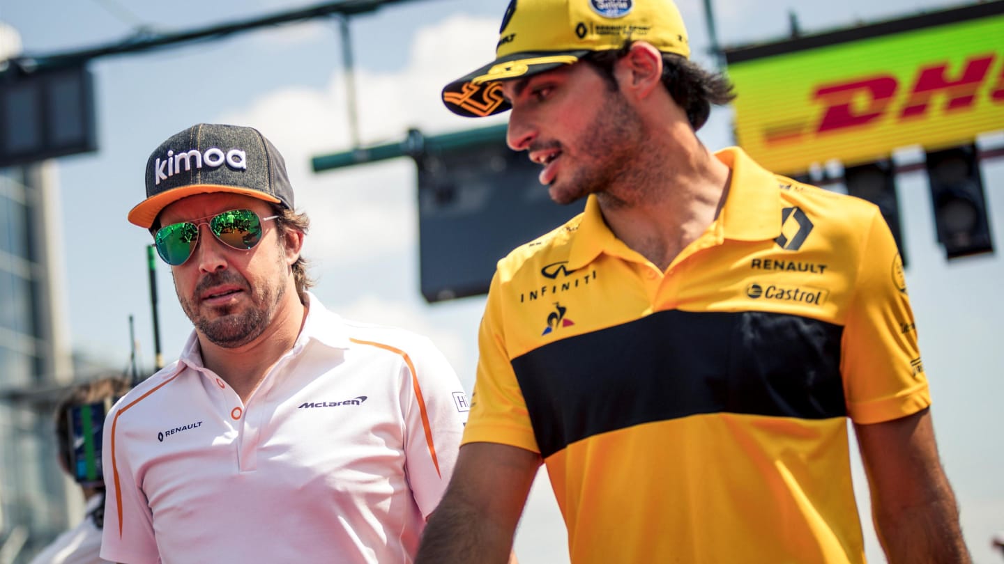 Fernando Alonso (ESP) McLaren and Carlos Sainz jr (ESP) Renault Sport F1 Team on the drivers parade