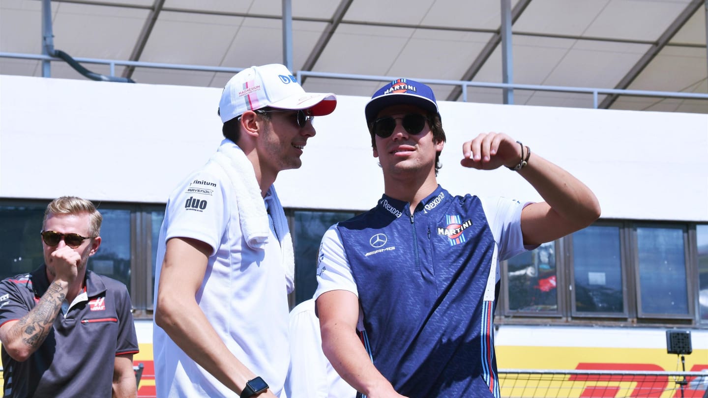 Esteban Ocon (FRA) Force India F1 and Lance Stroll (CDN) Williams on the drivers parade at Formula One World Championship, Rd12, Hungarian Grand Prix, Race, Hungaroring, Hungary, Sunday 29 July 2018. © Mark Sutton/Sutton Images