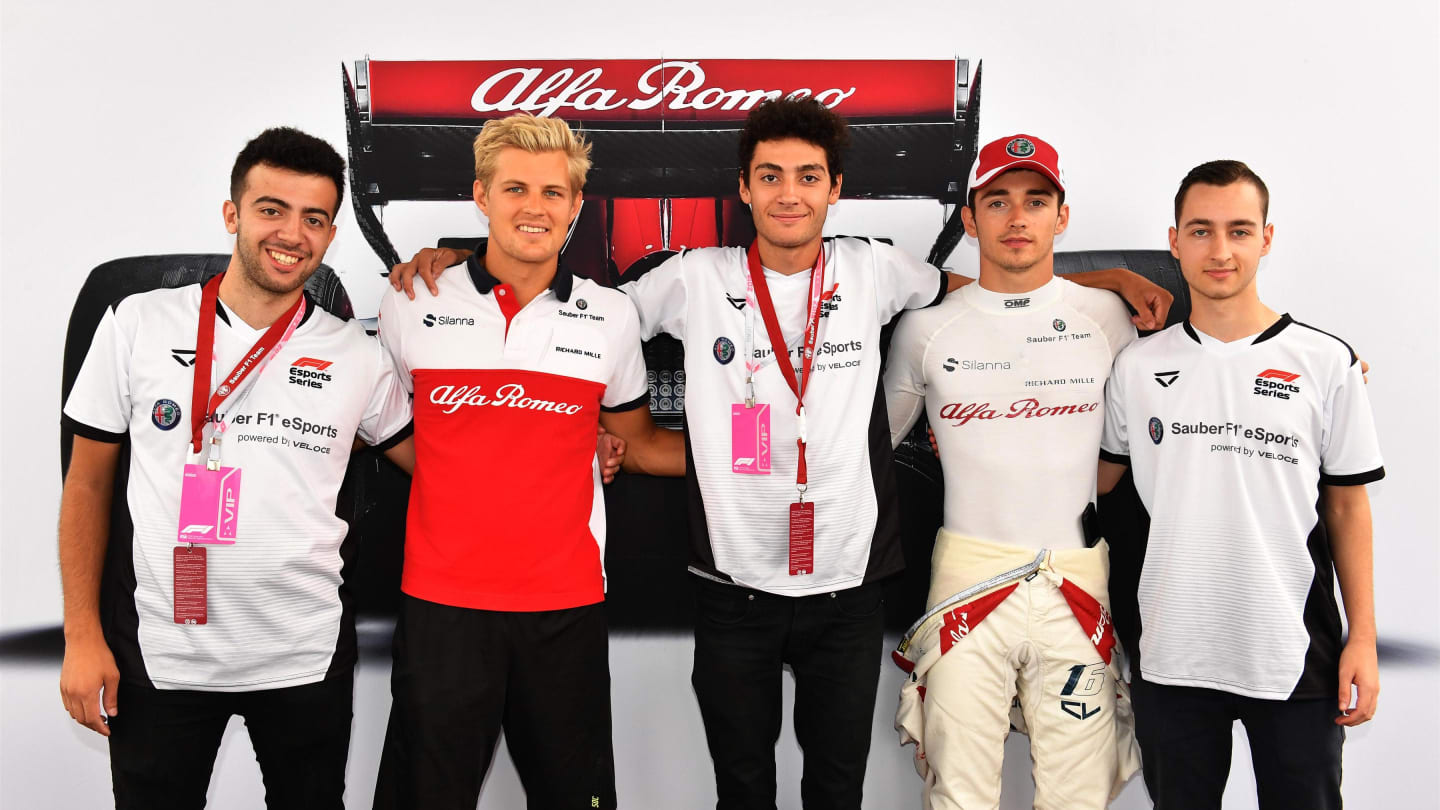 Marcus Ericsson, Alfa Romeo Sauber F1 Team and Charles Leclerc, Alfa Romeo Sauber F1 Team with eSports drivers at Formula One World Championship, Rd14, Italian Grand Prix, Practice, Monza, Italy, Friday 31 August 2018. © Mark Sutton/Sutton Images