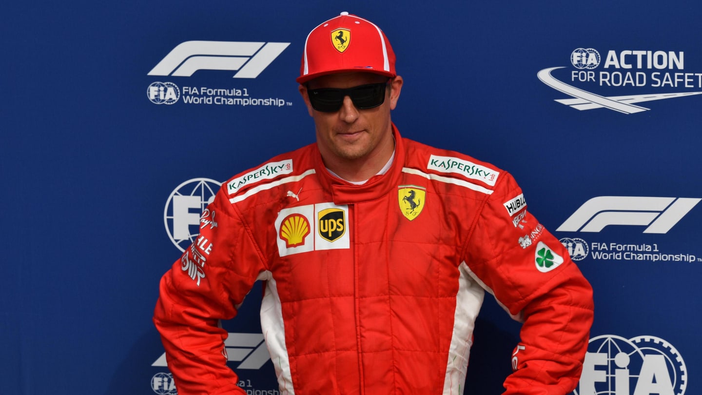Pole sitter Kimi Raikkonen, Ferrari in parc ferme at Formula One World Championship, Rd14, Italian