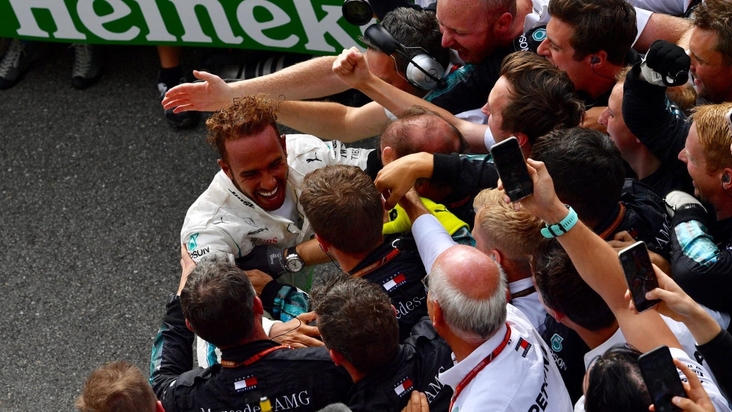 Lewis Hamilton, Mercedes AMG F1 celebrates with his mechanics in parc ferme at Formula One World Championship, Rd14, Italian Grand Prix, Race, Monza, Italy, Sunday 2 September 2018. © Jerry Andre/Sutton Images