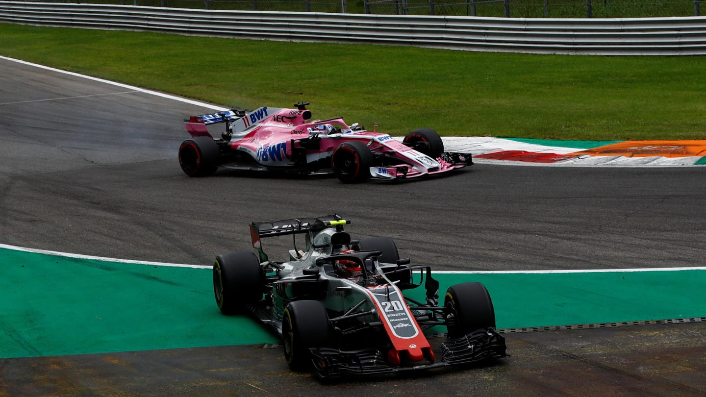 Kevin Magnussen, Haas F1 Team VF-18 missing the corner and Sergio Perez, Racing Point Force India