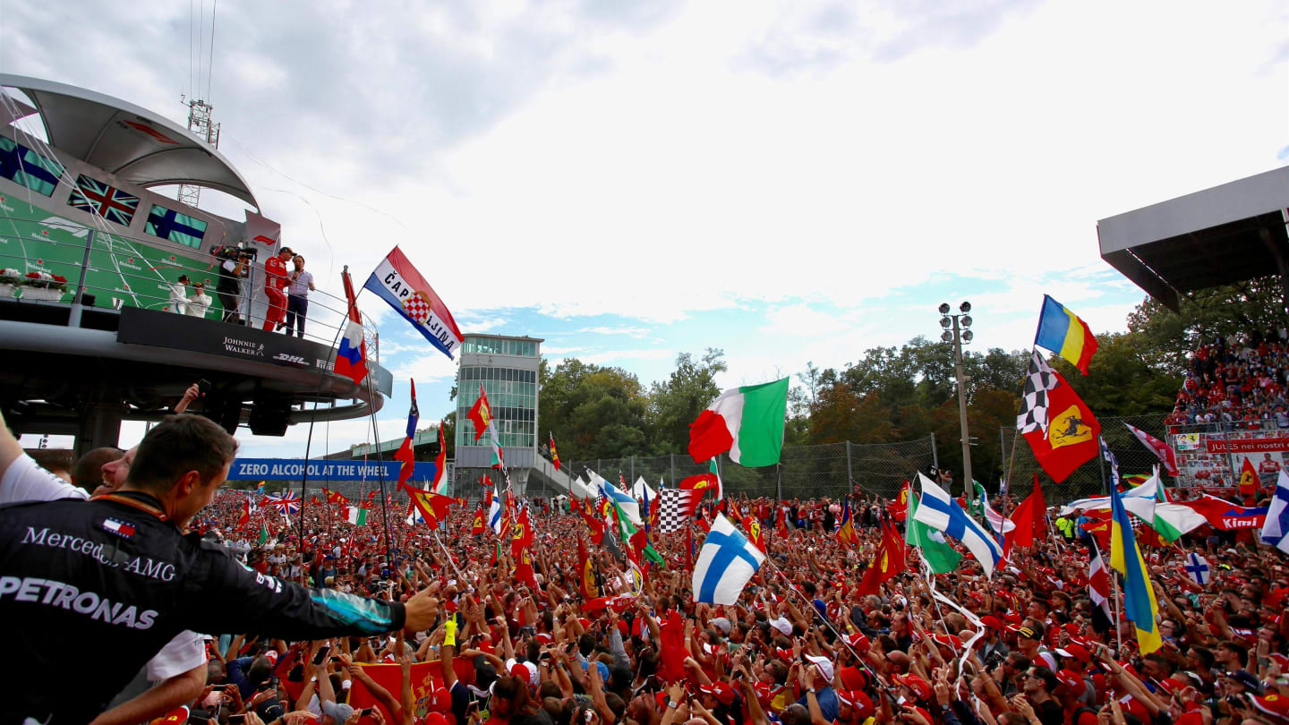 Fans invade the track to watch the podium at Formula One World Championship, Rd14, Italian Grand