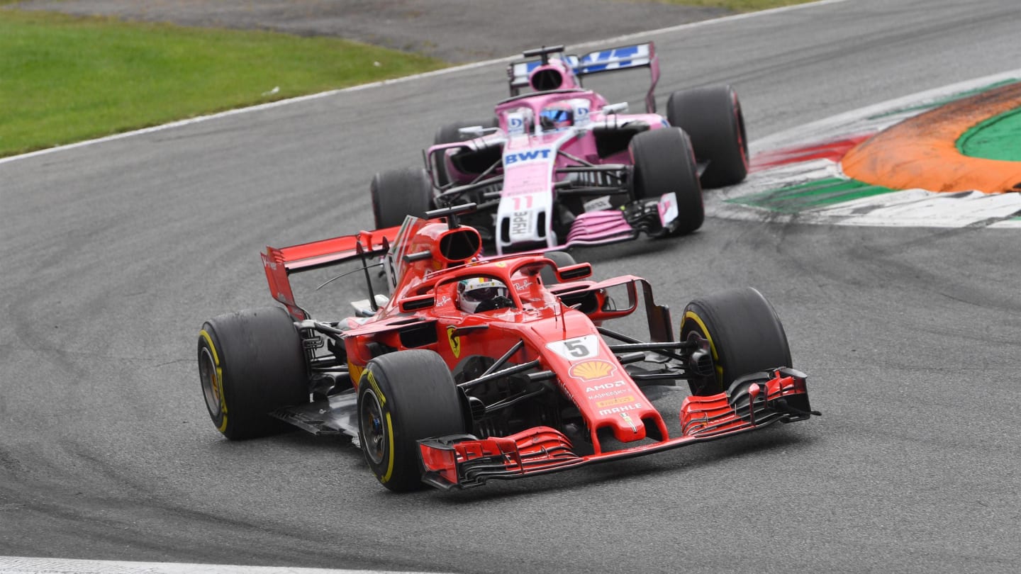 Sebastian Vettel, Ferrari SF71H and Sergio Perez, Racing Point Force India VJM11 battle at Formula