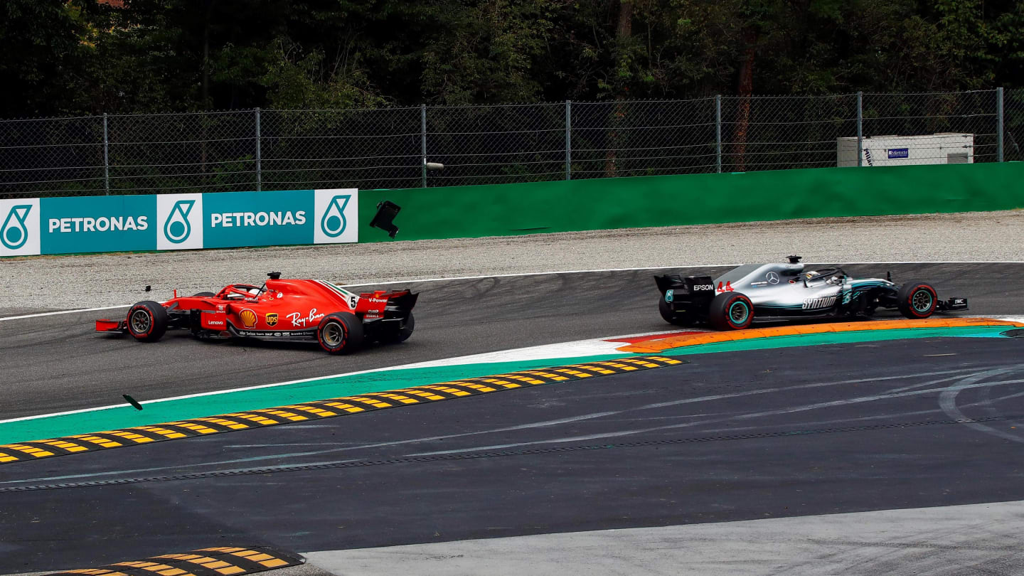 Sebastian Vettel, Ferrari SF71H spins after contact with Lewis Hamilton, Mercedes AMG F1 W09 on lap